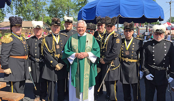 Father Fabian J. Maryanski will keep tradition alive by celebrating `Mass on the Midway` on Sunday, Aug. 13, at 10 a.m. as part of the Erie County Fair's Veterans Day commemorations. (Courtesy of Erie County Fair)
