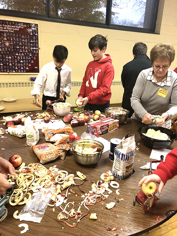 The students at Nativity of Our Lord School in Orchard Park had a very busy week.  Each class prepared part of a traditional Thanksgiving Feast to honor the faculty and staff of Nativity School and Parish.  They made everything from scratch including bread, butter, pies, applesauce, potatoes, jell-o and all the fixings of a Thanksgiving dinner.  The students and parents were excited to show their heartfelt thanks to all who do so much for the children.  The feast was a huge success for the school community and leftovers were brought to St. Luke's Mission of Mercy.
(Courtesy of Nativity of Our Lord School)
