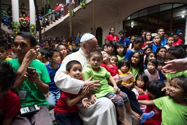 Pope Francis met with street children during his visit to the Philippines on January 16, 2015. Credit: ANSA/L'Osservatore Romano.