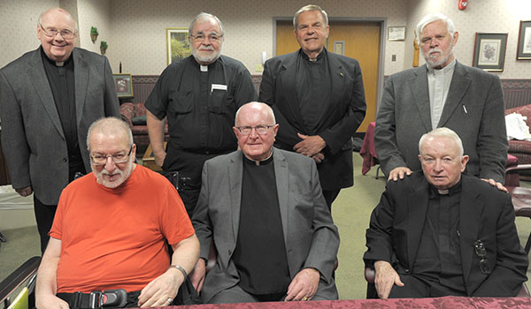 Priests from the ordination class of 1967 gather for lunch at the Brothers of Mercy Nursing Home and Rehabilitation Center in Clarence. Pictured in front (from left) are: Father Guy Siracuse, Father William Bigelow and Msgr. David Gallivan. In back are: Father Charles Zadora, Father Henry Orszulak, Father Mark Wolski and Father Robert Wild. (Dan cappellazzo/Staff Photographer)