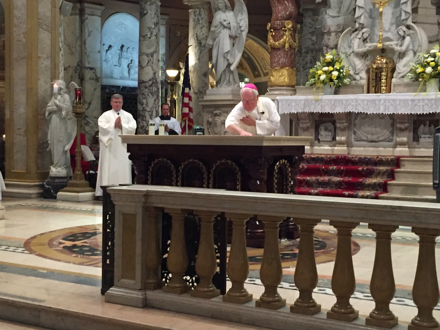 Bishop Richard J. Malone anoints new altar at Our Lady of Victory Basilica
