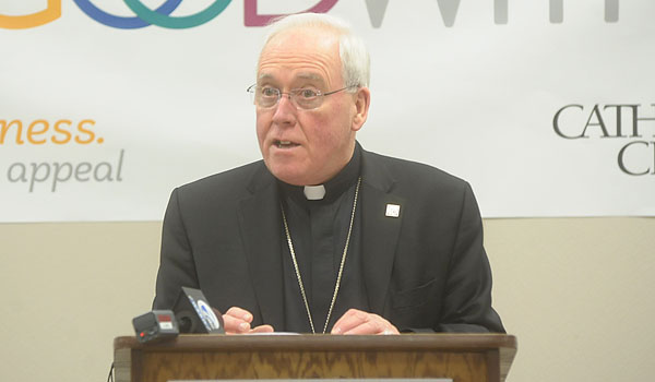 Bishop Richard J. Malone announces the total amount raised for the 2015 Appeal following the close of Appeal Week, which began March 22 and concluded on March 29. (Patrick McPartland/Staff Photographer)