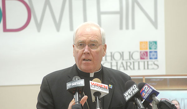 Bishop Richard J. Malone talks at a recent Catholic Charities press conference (Patrick McPartland/Staff Photographer)