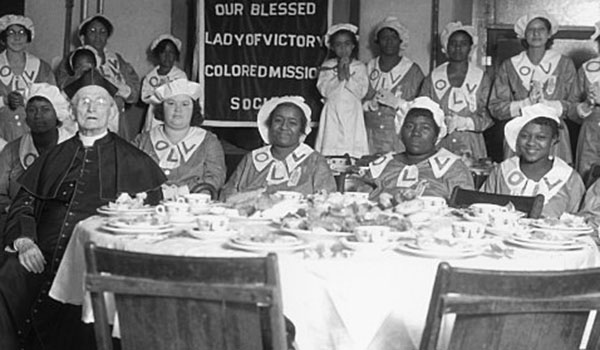 Venerable Nelson H. Baker with members of the Our Lady of Victory Colored Mission Society. (Courtesy of Our Lady of Victory)