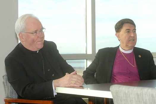 Bishop Richard Malone (left) and Bishop R. William Franklin are continuing their focus on helping the less fortunate in Buffalo. (File Photo)