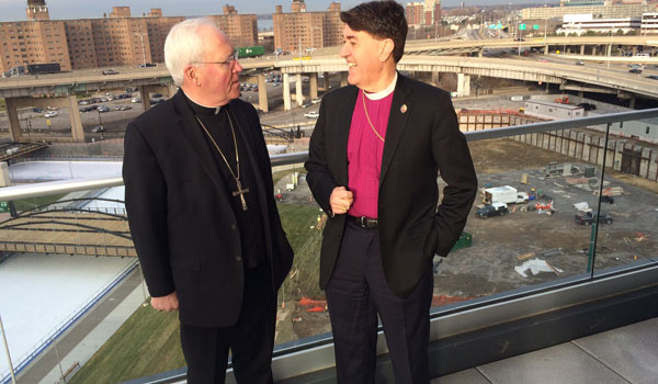 Bishop Richard J. Malone (left) of the Catholic Diocese and Bishop R. William Franklin of the Episcopal Diocese been working together since 2014. (Patrick McPartland/Staff Photographer)