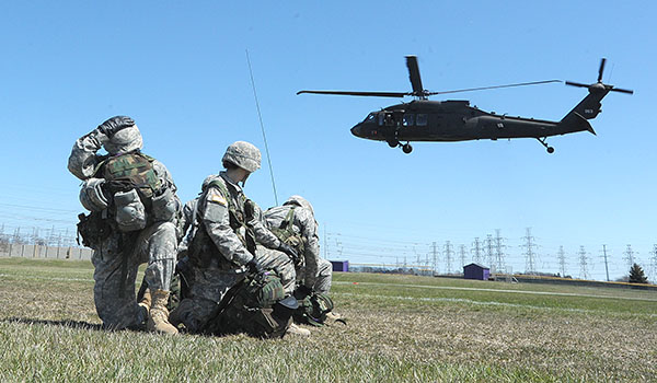 United States Army Blackhawk helicopters touch down at Niagara University on April 14 to escort 80-85 ROTC cadets from Niagara University and Canisius College to Fort Drum for a three day military training exercise. (Patrick McPartland/Staff Photographer)
