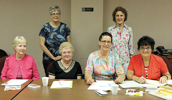 The Bishop's Committee for Christian Home and Family Visitors Program plan their Annual Meeting and Luncheon with Bishop Richard Malone on Thursday, October 6. Planning the meeting are (front row left to right) Marilyn Jubulis, Maureen Weber, Nancy Scherr and Sharon Brady (back row left to right) Juzanne Jasinski and Fran Kozminski (Patrick McPartland/Staff Photographer)