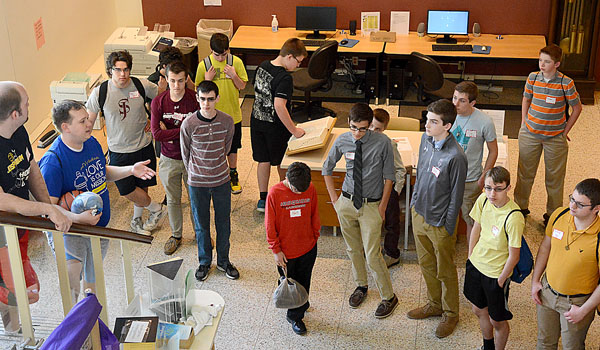 Bob Owczarczak gives a tour of Christ the King Seminary to high school boys from across the diocese as part of Breakfast and Games, sponsored by the Serra Club of Buffalo. Young men were invited to spend some time just `hanging out` with the priests and seminarians of Christ the King. (Patrick McPartland/Staff Photographer)