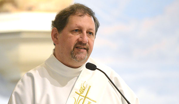 Deacon Michael Brown, who serves at Sacred Heart Parish in Bowmansville, will be ordained to the priesthood Saturday. (Patrick McPartland/Staff Photographer)