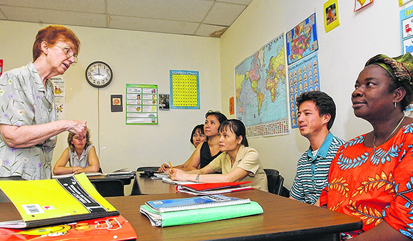 Sister Christina Pecoraro, OSF, teaches new immigrants at the Catholic Charities Immigration and Refugee Assistance Program on Franklin Street in Buffalo. The Share the Journey 5K race will benefit Catholic Charities' Immigration and Refugee Assistance Program. (File Photo)