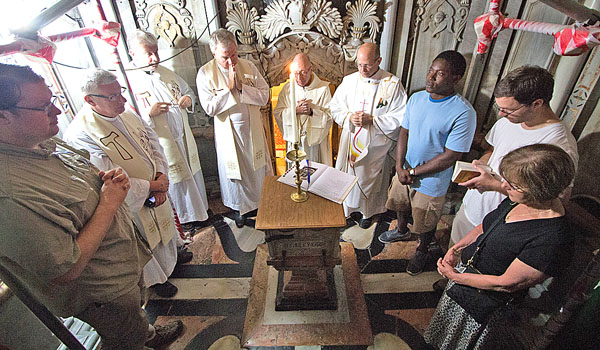 Faculty and seminarians from Christ the King Seminary celebrate Mass inside the Tomb of Christ at the Church of the Holy Sepulchre in Jerusalem. (Courtesy of Christ the King Seminary)