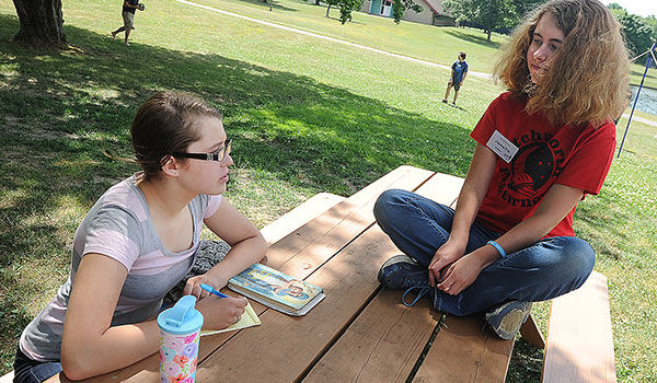 15-year-old Sarah Herr, from the St. Christopher Parish, speaks during the annual Christian Leadership Institute event at Christ the King seminary in East Aurora. The program helps Catholic teens connect with their faith. (Dan Cappellazzo/Staff Photographer)