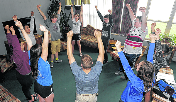 Area young Catholics participate in a group bonding exercise at the Christ the King Seminary during the Christian Leadership Institute summer camp. (Dan Cappellazzo/Staff Photographer)