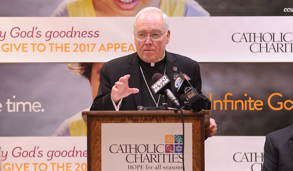 Bishop Richard Malone speaks during at Catholic Charities headquarters as he announces progress on the $11 million goal for this years campaign. (Dan Cappellazzo/Staff Photographer)