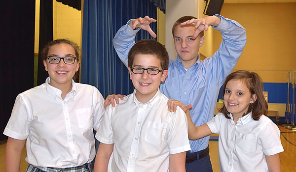 Scrooge, center, played by Aidan Losito, meets the three Christmas ghosts: from left, Abigail Karaszewski, Garett Beach and Allison Zelazo. The production of `A Christmas Carol` will be presented by St. Mary School in Swormville on Dec. 14. (Courtesy of St. Mary School)
