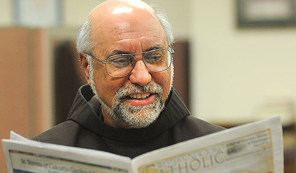 Father James Vacco, of St. Bonaventure University, is the honorary chair of the 2018 Catholic Communication Campaign. (Dan Cappellazzo/Staff Photographer)