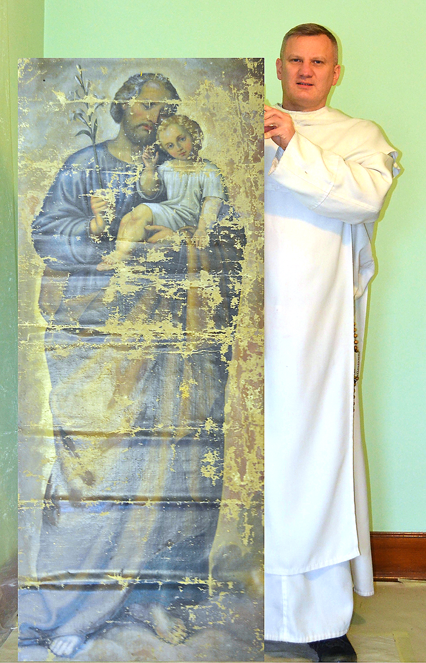 Courtesy of Corpus Christi Parish - This painting of St. Joseph was found in the basement of the former convent of Corpus Christi Parish in Buffalo. Father Michal Czyzewski hopes to raise funds to restore the icon. 