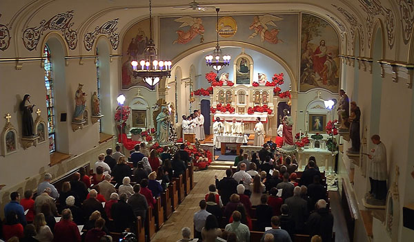 Daybreak TV pre-records the Christmas Mass at Our Lady Help of Christians Church on Oct. 22. Interfaith Broadcasting Commission chose the Diocese of Buffalo to record the Mass that will be shown by approximately 90 percent of the ABC affiliates across the country.