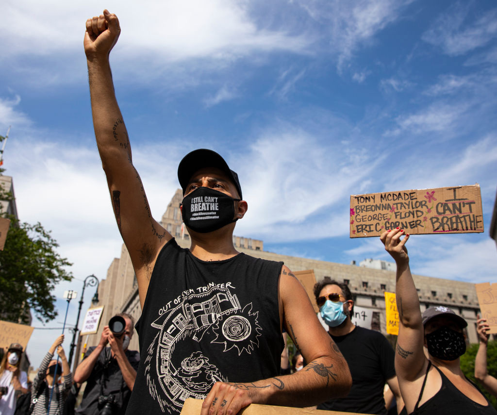 Protesters gather during a rally against the death of Minneapolis, Minnesota man George Floyd at the hands of police on May 29, 2020 in Foley Square in the Manhattan borough of New York City. Floyd's death was captured on video that went viral of the incident. One of the four policemen taking part in Floyd's arrest was arrested and charged with 3rd-degree murder and manslaughter. (Photo by Robert Nickelsberg/Getty Images)