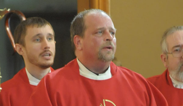 Father Sean E. DiMaria (center)