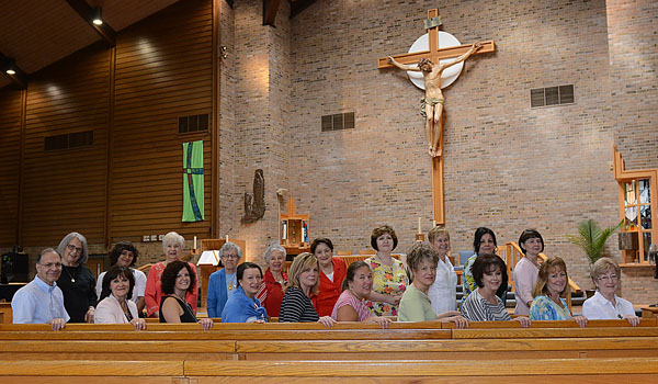 Members of the `Disciples of Divine Mercy in the Holy Face of Jesus` gather for a meeting on their special ministry.
(Patrick McPartland/Staff Photographer)