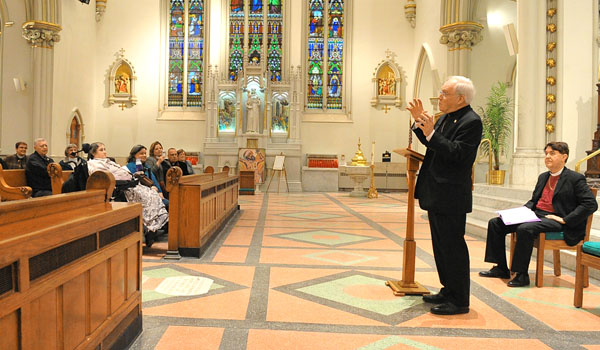 `Conversation with Two Bishops: A Discover Sunday Event,` is co-hosted by Bishop Richard J. Malone (standing) of the Roman Catholic Diocese of Buffalo, and Bishop R. William Franklin (seated) of the Episcopal Diocese of Western New York, at St. Joseph Cathedral. (Patrick McPartland/Staff Photographer)