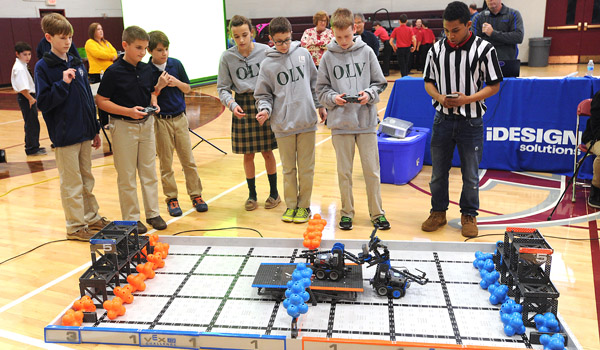 6th grade students from Queen of Heaven and Our Lady of Victory participate in the Robot challenge during the Diocese of Buffalo 3rd Annual X-Stream Games and Expo. Area Catholic elementary and middle school students competed in the county-wide science fair held at St. Joseph's Institute which inspired the next generation of innovators, scientists and believers. (Dan Cappellazzo/Staff Photographer)