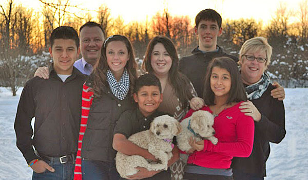 The Donahues (from left), Oscar, Paul, Eileen, Cristian, Emily, Matthew, Silvia and Clare, gather for a family photo.