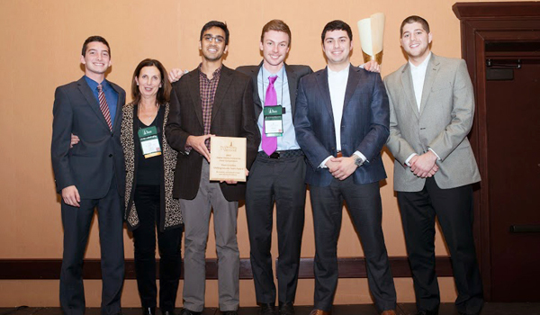 Members of SBU's Family Business Club competed against teams from around the world at the Family Enterprise Case Competition at the University of Vermont. Pictured with event organizer Rustin Nethercott (left) are Dr. Carol Wittmeyer, SBU Family Business Club coach, and Vikas Kotha, Peyton Leveillee (SBU team ambassador), James Rynone and Benjamin Marcus.