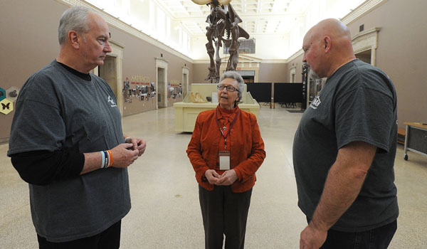 Diocese of Buffalo Catholic School's Superintendent Sister Carol Cimino, SSJ, speaks to Finding Noah producer and co-editor Jonathan Shaw, a former St. Joseph's Collegiate graduate, and director Brent Baum, at the Buffalo Museum of Science during a showing of the movie to students from seven area Catholic schools. (Dan Cappellazzo/Staff Photographer)