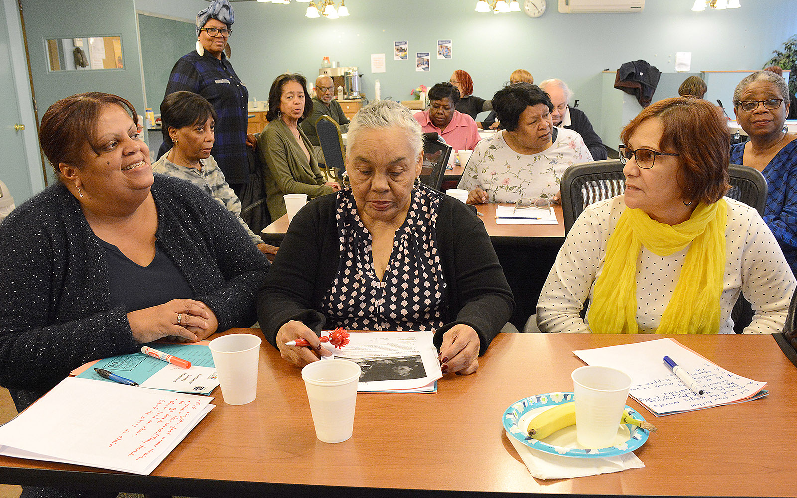  Ruth Quinones, Zoraida Montilla and Carman Rivera speak during the In-service for Foster Grandparent program at the Catholic Charities Garden Room at 128 Wilson Street, Buffalo. The three work in schools throughout Western New York.
Dan Cappellazzo/Special to The Sun