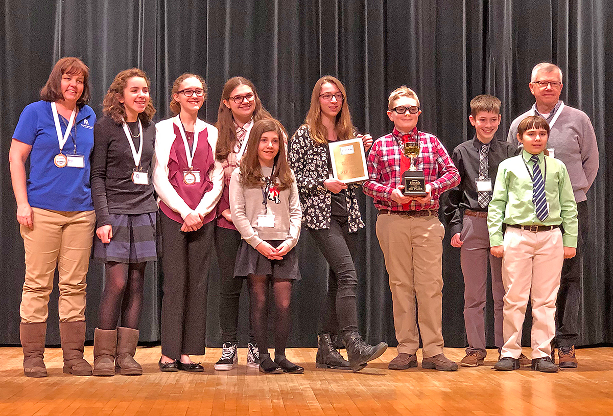 St. Mary School in Swormville students and teachers show off the third place awards and medals they won at the Future Cities competition in January. St Mary was the top scoring Catholic school and were given special recognition for their energy efficiency presentation. (Courtesy of Julie Leong/St. Mary School)