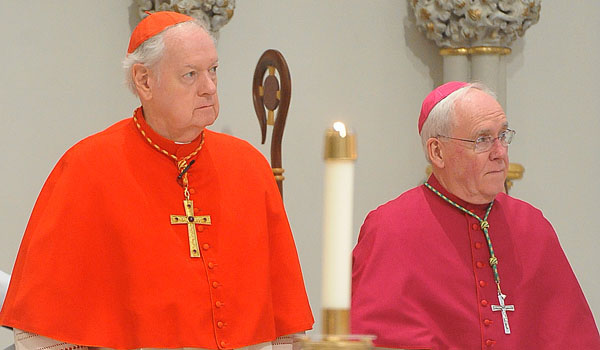 Cardinal Edward M. Egan (left) and Bishop Richard J. Malone helped celebrate Bishop Edward M. Grosz's anniversary in February. (Patrick McPartland/Staff Photographer)