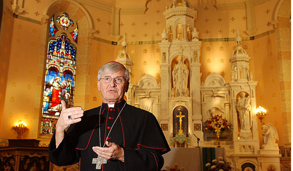 Bishop Edward Grosz stands in St. Stanislaus Church after being appointed pastor and vicar for Southeast Buffalo. 