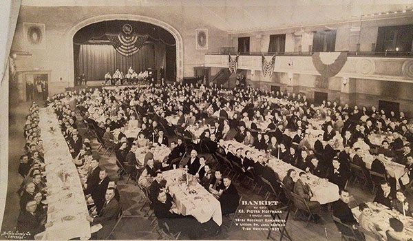 In its prime a large banquet was held in the lyceum in April 1937. Now the St. John Kanty's lyceum theater lies empty. The Broadway Street parish is trying to find a way to reuse the historic facility. (File Photo and Dan Cappellazzo/Staff Photographer)