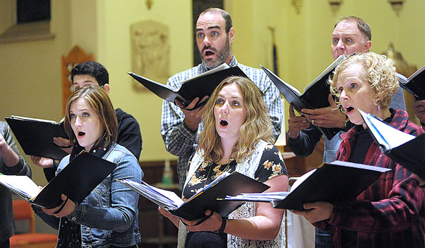 Members of the Harmonia Chamber Choir sing during practice at Blessed Sacrament Church in Buffalo. Harmonia is an award-winning choir that performs in area churches. (Dan Cappellazzo/Staff Photographer)