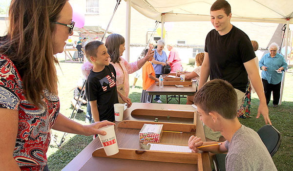 Sun and fun under the tents at the Blessed Mary Angela Parish Lawn Fete. (Courtesy of Paulette Pacos)