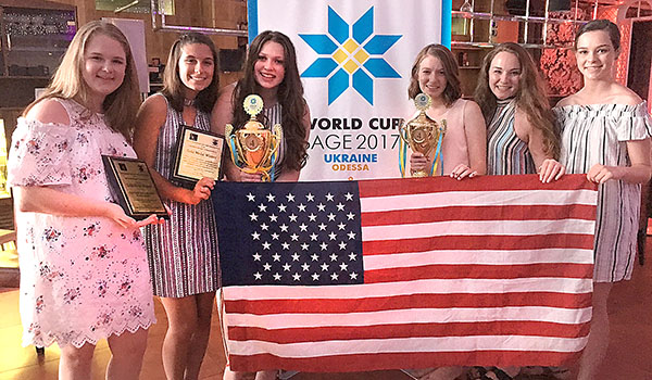 Kaitlin Brill, Abigail Bradley, Emily Bingham, Marissa Brandel, Heather Fitzgerald, Celia Rahill display their award at the 2017 SAGE World Cup in Odessa, Ukraine. The Mount St. Mary students represented their school in a global Entrepreneurial competition. (Courtesy of Mount St. Mary Academy)