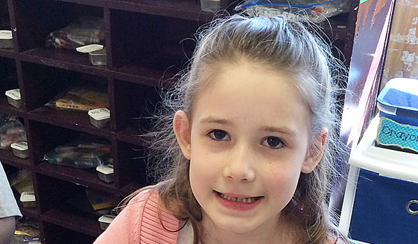 Grace Mallaber, a first-grader at Notre Dame Academy in Buffalo, started a collection to donate art supplies to the pediatric wing of Roswell Park Cancer Institute. (Courtesy of Notre Dame Academy)