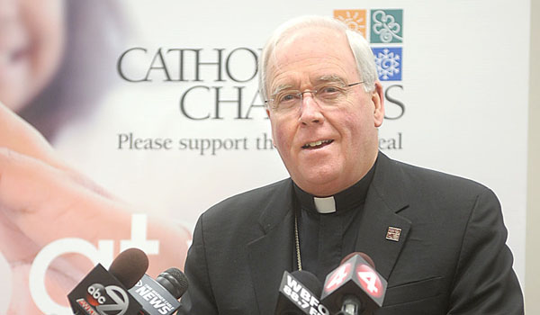 Bishop Richard J. Malone speaks at a recent Catholic Charities press conference. (Patrick McPartland/Staff Photographer)