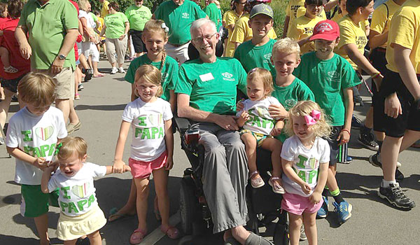 Mike Maloney poses proudly with his grandchildren at the Walk to Defeat ALS in 2015. Maloney cites his strong Catholic faith in helping him in his fight against ALS, commonly known as Lou Gehrig's disease. (Courtesy of Mike Maloney)