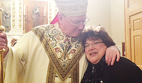 Diocesan Director for Pro-Life Activities Cheryl Calire (right) gets a hug from Cardinal Timothy Dolan Archbishop of New York at the March for Life in Washington, D.C.
(Courtesy of Cheryl Calire)