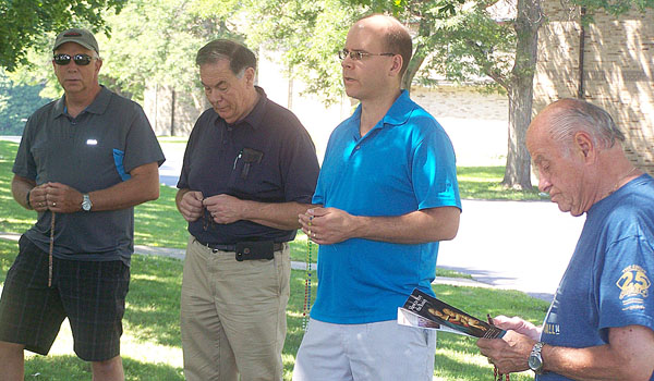 Participants in the Aug. 26-28 Men's Retreat pray the rosary at Christ the King Seminary in East aurora. The retreat is a joint venture between the Holy Name societies of Buffalo and St. Catharine's, Ontario. (Patrick J. Buechi/Staff)