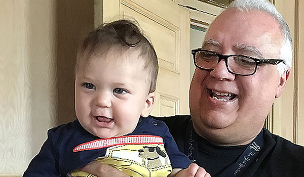 David Calire holds Giovanni at the Mother Teresa Home, where the baby's mother, Kaitlyn, lived during her pregnancy.