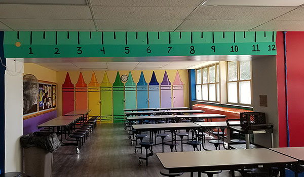 Local artist Emily Leone Meidenbauer turned a ceiling beam into a ruler, and a wall into crayons. (Courtesy of NDA)
