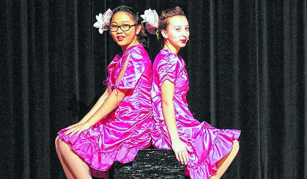 Murphy McDermott (right), along with Elizabeth Judd, perform in Mount St. Mary Academy's production of 42nd Street. McDermott, a freshman, has recently performed at Carnegie Hall as part of the Crescendo International competition. (Photo by Tim McGraw)