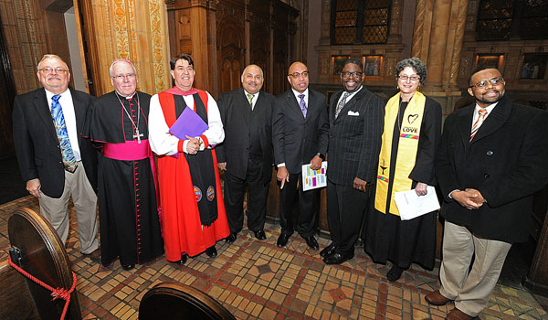 Bishop Richard J. Malone is joined by fellow religious leaders from the Greater Buffalo Equity Roundtable, which hosted an interfaith prayer service on the National Day of Racial Healing.(Dan Cappellazzo/Staff Reporter)