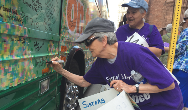 Sister Eilleen O'Connor, RSM and Sister Cristel Mejia, RSM sign on to the 'Nuns on the Bus' movement (Patrick McPartland )