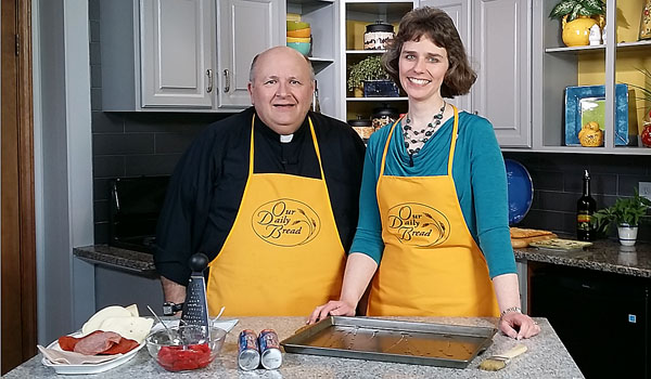 On this month's episode of `Our Daily Bread,` Father Paul D. Seil will cook with Kathy Goller, diocesan director of Youth and Young Adult Ministry. (Courtesy of Daybreak TV Productions)